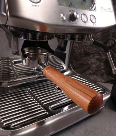 54mm-bottomless-portafilter-redwood-handle-extractionphoto-partscomeapart-on breville machine
